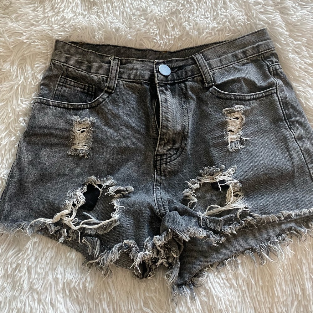 Black jean shorts with rips